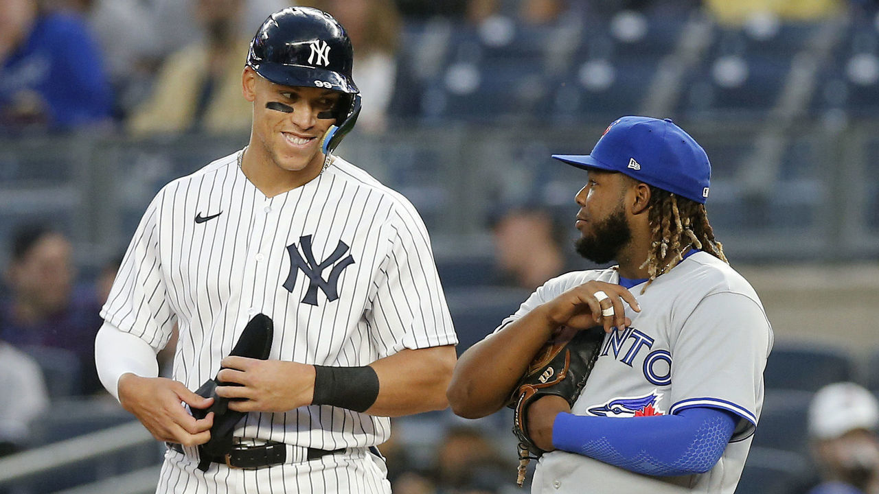 NEW YORK, NEW YORK - APRIL 13: Aaron Judge #99 of the New York Yankees in action against Vladimir Guerrero Jr. #27 of the Toronto Blue Jays at Yankee Stadium on April 13, 2022 in New York City. The Blue Jays defeated the Yankees 6-4.