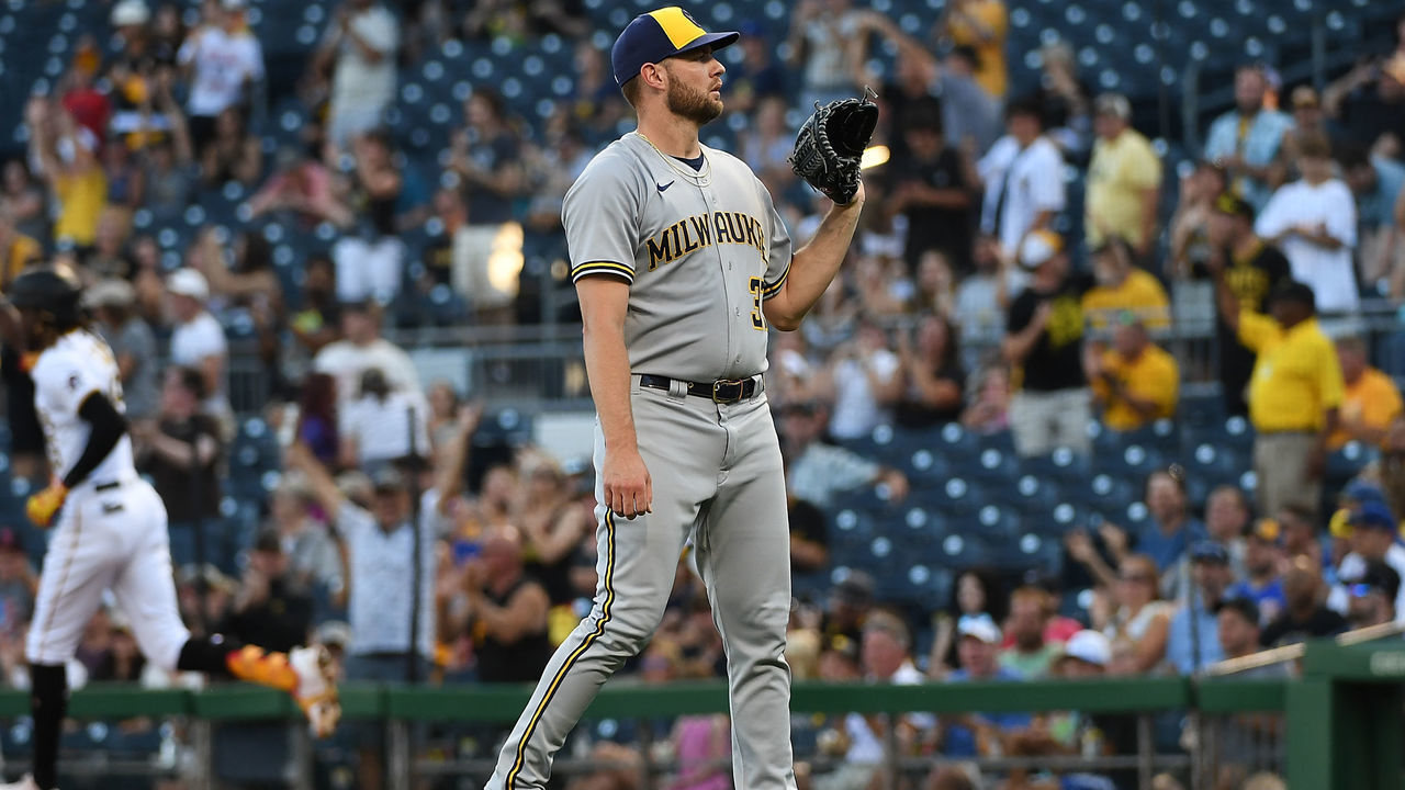 PITTSBURGH, PA - JUNE 30: Adrian Houser #37 of the Milwaukee Brewers waits for a new ball as Oneil Cruz #15 of the Pittsburgh Pirates rounds the bases after hitting a two run home run in the second inning during the game at PNC Park on June 30, 2022 in Pittsburgh, Pennsylvania.