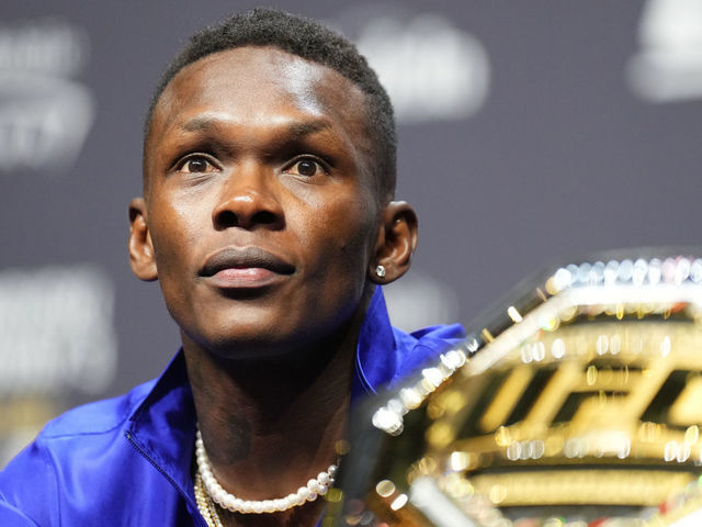 LAS VEGAS, NEVADA - JUNE 30: Israel Adesanya of Nigeria is seen on stage during the UFC 276 press conference at T-Mobile Arena on June 30, 2022 in Las Vegas, Nevada.