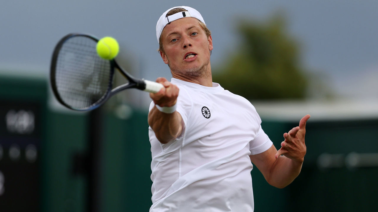 LONDON, ENGLAND - JULY 01: Tim van Rijthoven of Netherlands plays a forehand against Nikoloz Basilashvili of Georgia during their Men's Singles Third Round match on day five of The Championships Wimbledon 2022 at All England Lawn Tennis and Croquet Club on July 01, 2022 in London, England.