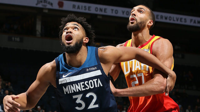 MINNEAPOLIS, MN - DECEMBER 11: Karl-Anthony Towns #32 of the Minnesota Timberwolves boxes out Rudy Gobert #27 of the Utah Jazz on December 11, 2019 at Target Center in Minneapolis, Minnesota. Mandatory Copyright Notice: Copyright 2019 NBAE