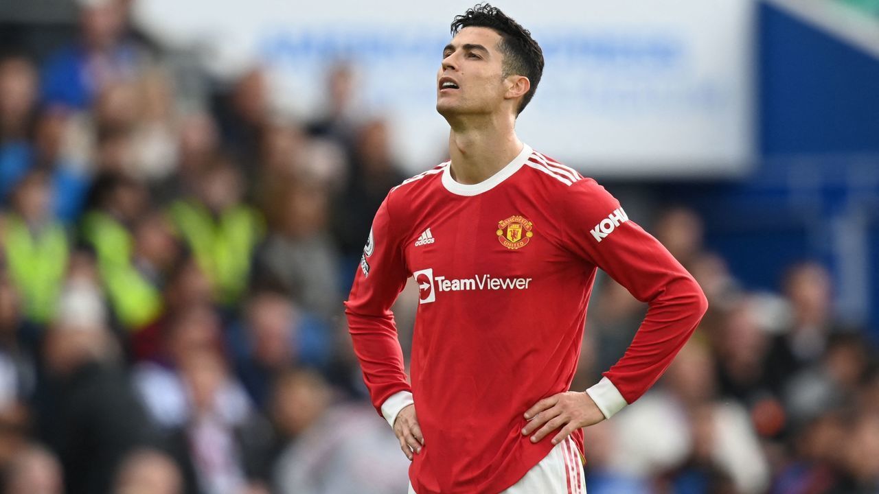 Manchester United's Portuguese striker Cristiano Ronaldo reacts during the English Premier League football match between Brighton and Hove Albion and Manchester United at the American Express Community Stadium in Brighton, southern England on May 7, 2022. - RESTRICTED TO EDITORIAL USE. No use with unauthorized audio, video, data, fixture lists, club/league logos or 'live' services. Online in-match use limited to 120 images. An additional 40 images may be used in extra time. No video emulation. Social media in-match use limited to 120 images. An additional 40 images may be used in extra time. No use in betting publications, games or single club/league/player publications.