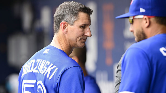 NEW YORK, NEW YORK - JULY 25: Mark Budzinski #53 of the Toronto Blue Jays looks on in the dugout against the New York Mets at Citi Field on July 25, 2021 in the Queens borough of New York City.