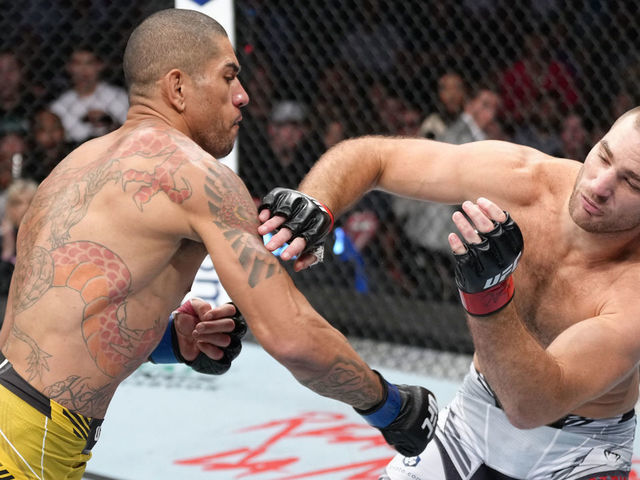 LAS VEGAS, NEVADA - JULY 02: Alex Pereira of Brazil punches Sean Strickland during the UFC 276 event at T-Mobile Arena on July 02, 2022 in Las Vegas, Nevada.