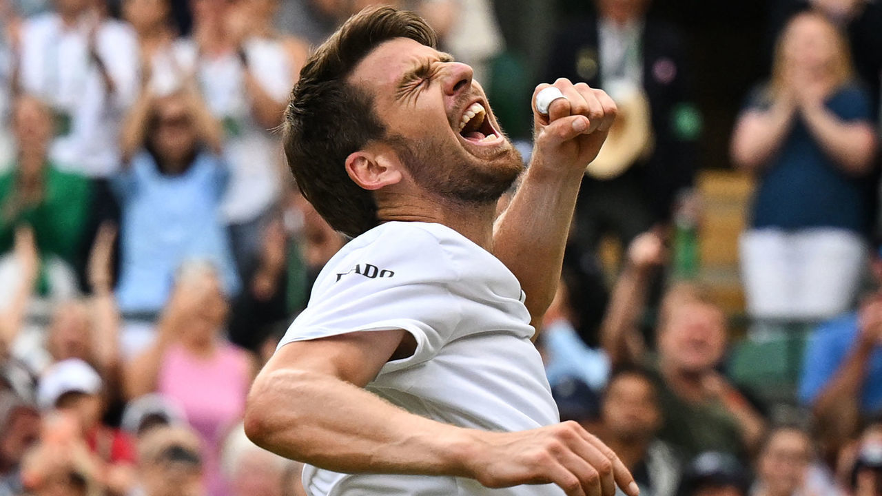 Britain's Cameron Norrie celebrates winning against US player Tommy Paul during their round of 16 men's singles tennis match on the seventh day of the 2022 Wimbledon Championships at The All England Tennis Club in Wimbledon, southwest London, on July 3, 2022. - RESTRICTED TO EDITORIAL USE