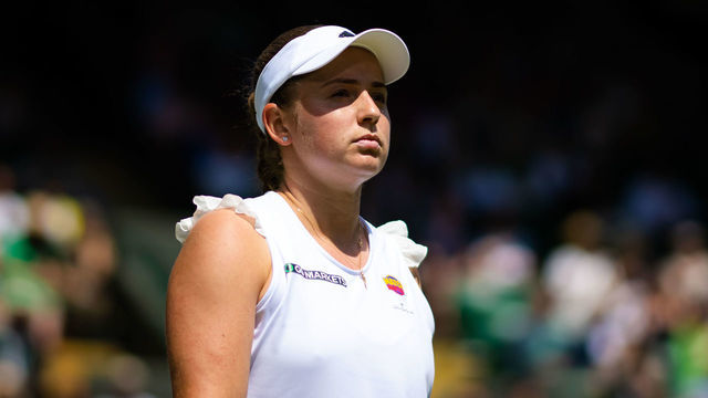 LONDON, ENGLAND - JULY 03: Jelena Ostapenko of Latvia in action against Tatjana Maria of Germany in her fourth round match during Day Seven of The Championships Wimbledon 2022 at All England Lawn Tennis and Croquet Club on July 03, 2022 in London, England