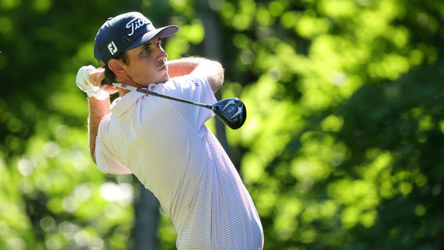 SILVIS, ILLINOIS - JULY 03: J.T. Poston of the United States plays his shot from the 17th tee during the final round of the John Deere Classic at TPC Deere Run on July 03, 2022 in Silvis, Illinois.