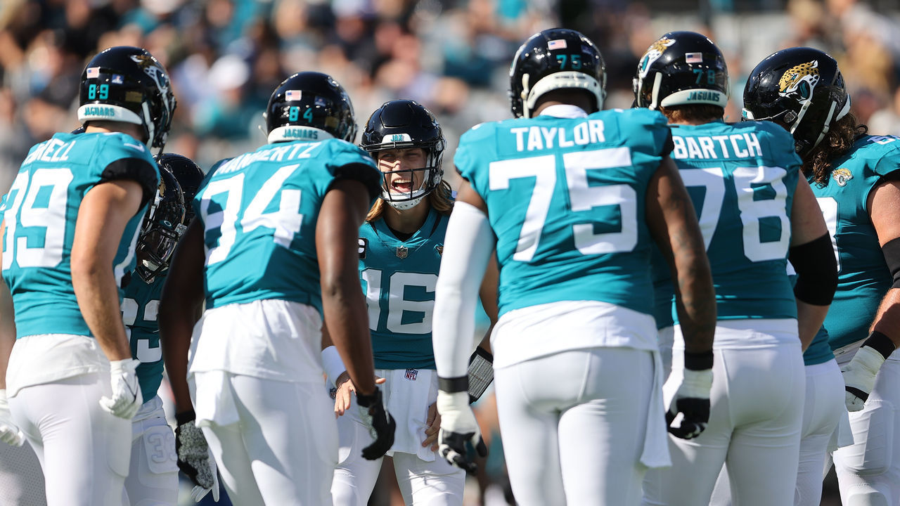 JACKSONVILLE, FL - JANUARY 09: Jacksonville Jaguars quarterback Trevor Lawrence (16) calls the play in t he huddle during the game between the Indianapolis Colts and the Jacksonville Jaguars on January 9, 2022 at TIAA Bank Field in Jacksonville, FL