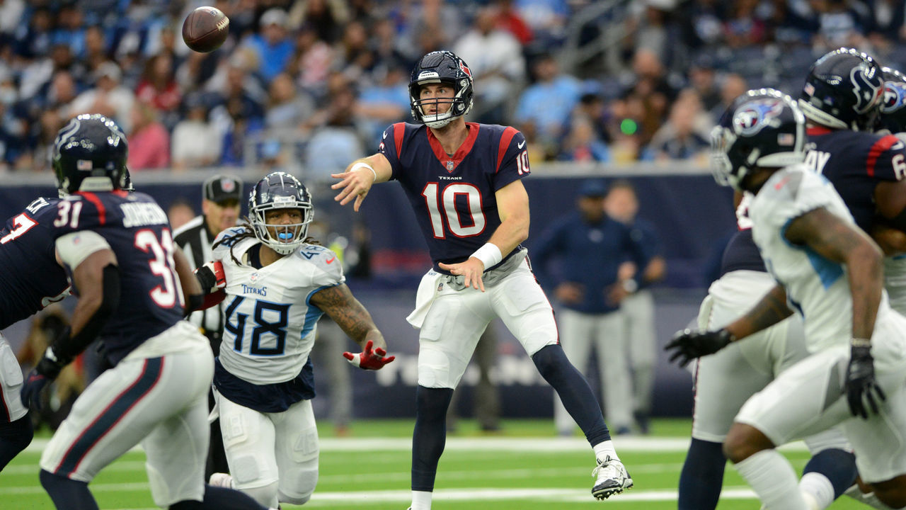 HOUSTON, TX - JANUARY 09: Houston Texans QB Davis Mills throws a pass during an NFL game between the Houston Texans and the Tennessee Titans on January 9, 2022 at NRG Stadium in Houston, TX.