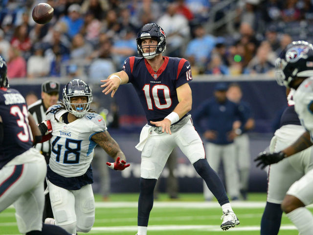 HOUSTON, TX - JANUARY 09: Houston Texans QB Davis Mills throws a pass during an NFL game between the Houston Texans and the Tennessee Titans on January 9, 2022 at NRG Stadium in Houston, TX.