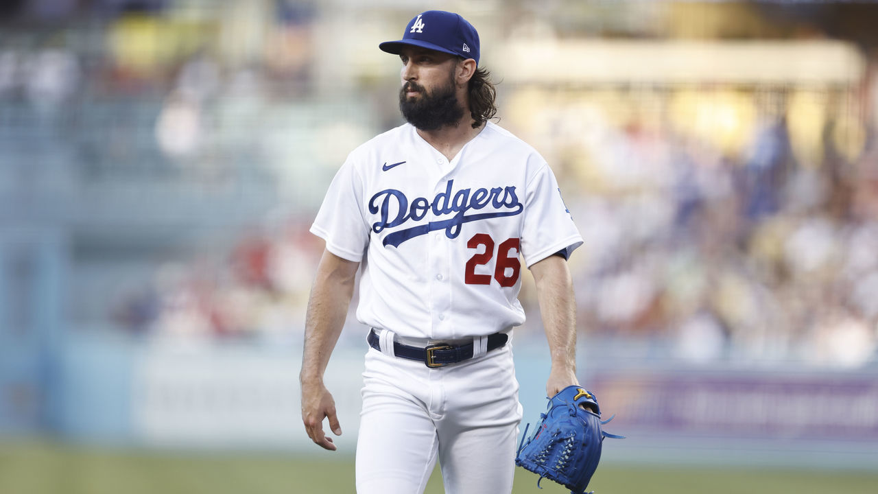 LOS ANGELES, CALIFORNIA - JUNE 14: Tony Gonsolin #26 of the Los Angeles Dodgers looks on as he walks to the dugout during a game against the Los Angeles Angels the first inning at Dodger Stadium on June 14, 2022 in Los Angeles, California.