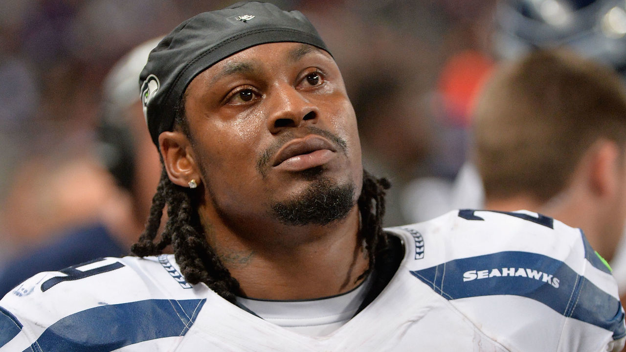 ST. LOUIS, MO - OCTOBER 19: Marshawn Lynch #24 of the Seattle Seahawks watches from the sidelines during a game against the St. Louis Rams at the Edward Jones Dome on October 19, 2014 in St. Louis, Missouri.