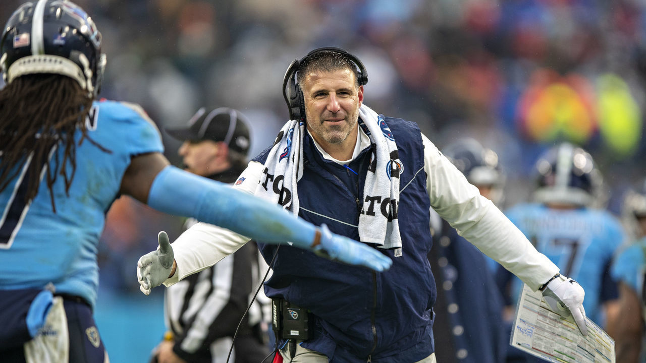 NASHVILLE, TENNESSEE - JANUARY 2: Head Coach Mike Vrabel of the Tennessee Titans congratulates his players as they come off the field during a game against the Miami Dolphins at Nissan Stadium on January 2, 2022 in Nashville, Tennessee. The Titans defeated the Dolphins 34-3.