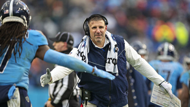 NASHVILLE, TENNESSEE - JANUARY 2: Head Coach Mike Vrabel of the Tennessee Titans congratulates his players as they come off the field during a game against the Miami Dolphins at Nissan Stadium on January 2, 2022 in Nashville, Tennessee. The Titans defeated the Dolphins 34-3.