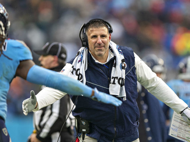 NASHVILLE, TENNESSEE - JANUARY 2: Head Coach Mike Vrabel of the Tennessee Titans congratulates his players as they come off the field during a game against the Miami Dolphins at Nissan Stadium on January 2, 2022 in Nashville, Tennessee. The Titans defeated the Dolphins 34-3.