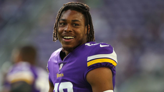 MINNEAPOLIS, MN - AUGUST 21: Justin Jefferson #18 of the Minnesota Vikings looks on before the start of a preseason game against the Indianapolis Colts at U.S. Bank Stadium on August 21, 2021 in Minneapolis, Minnesota. The Colts defeated the Vikings 12-10.