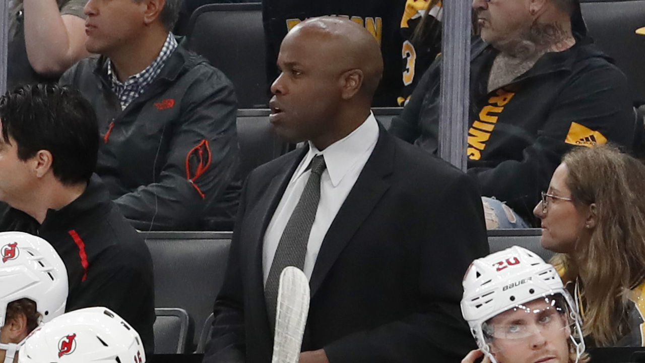 BOSTON, MA - SEPTEMBER 25: New Jersey Devils assistant coach Mike Grier during a preseason game between the Boston Bruins and the New Jersey Devils on September 25, 2019, at TD Garden in Boston, Massachusetts.