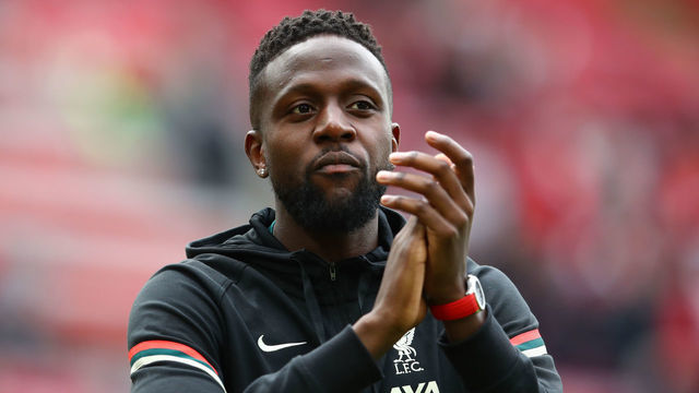 LIVERPOOL, ENGLAND - MAY 22: Divock Origi of Liverpool applauds at the end of the Premier League match between Liverpool and Wolverhampton Wanderers at Anfield on May 22, 2022 in Liverpool, United Kingdom.