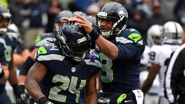 SEATTLE, WA - NOVEMBER 02: Quarterback Russell Wilson #3 of the Seattle Seahawks celebrates with running back Marshawn Lynch #24 of the Seattle Seahawks after Lynch scored a touchdown during the first quarter of the game against the Oakland Raiders at CenturyLink Field on November 2, 2014 in Seattle, Washington.