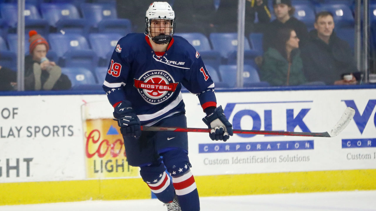 PLYMOUTH, MICHIGAN - JANUARY 17: Cutter Gauthier #19 of Team Blue skates up the ice in the third period of the USA Hockey All-American Game at USA Hockey Arena on January 17, 2022 in Plymouth, Michigan.