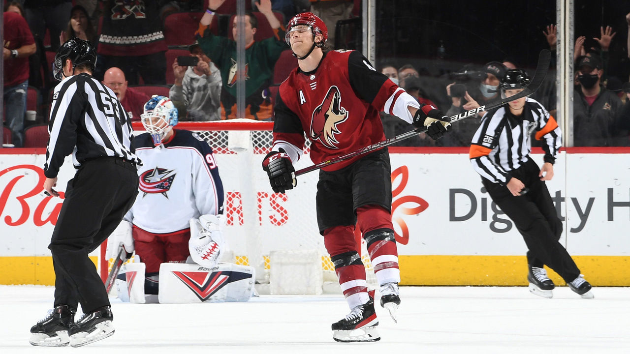 GLENDALE, ARIZONA - NOVEMBER 18: Jakob Chychrun #6 of the Arizona Coyotes skates back to the bench after scoring a shoot out goal against Elvis Merzlikins #90 of the Columbus Blue Jackets at Gila River Arena on November 18, 2021 in Glendale, Arizona.