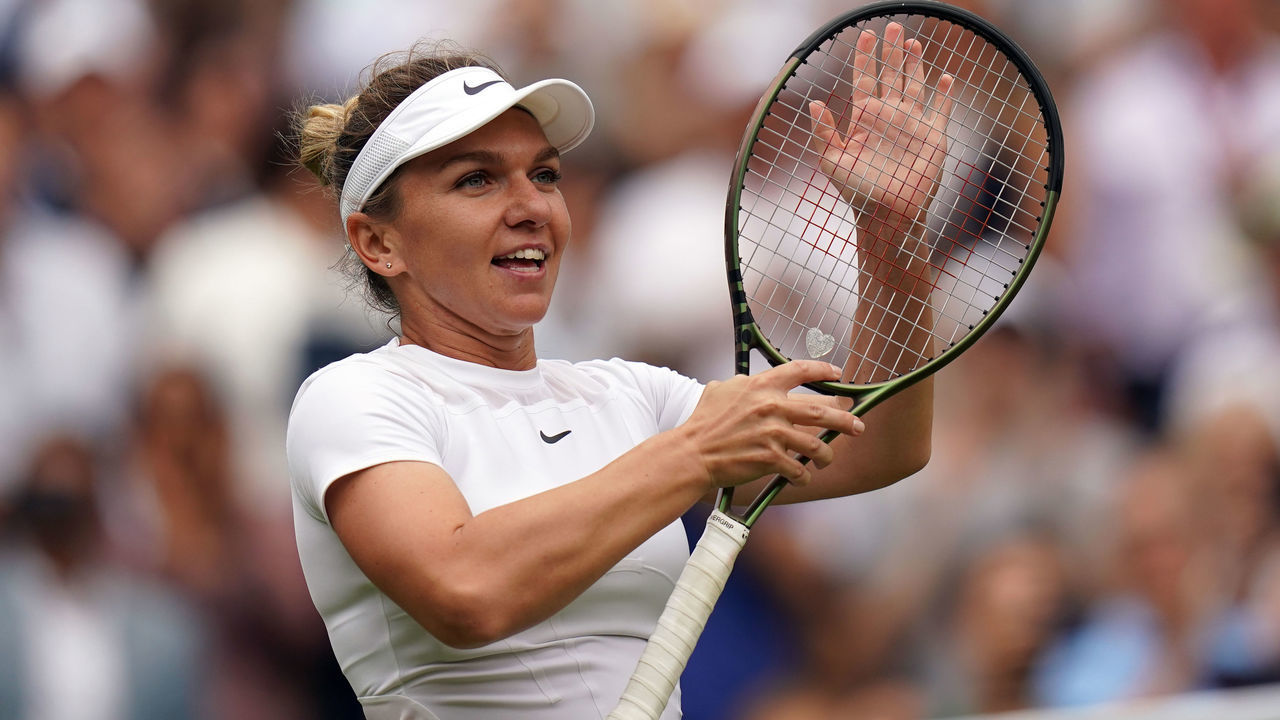 Simona Halep celebrates victory over Amanda Anisimova in the Ladies Quarter Final match on day ten of the 2022 Wimbledon Championships at the All England Lawn Tennis and Croquet Club, Wimbledon. Picture date: Wednesday July 6, 2022.
