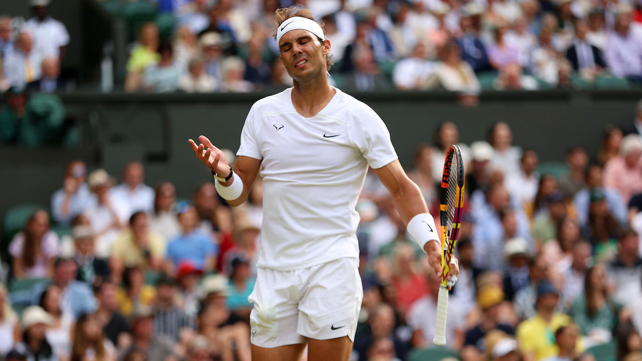 LONDON, ENGLAND - JULY 06: Rafael Nadal of Spain reacts against Taylor Fritz of The United States during their Men's Singles Quarter Final match on day ten of The Championships Wimbledon 2022 at All England Lawn Tennis and Croquet Club on July 06, 2022 in London, England.