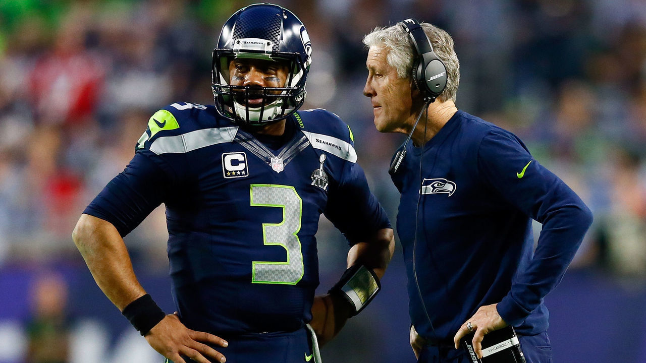 GLENDALE, AZ - FEBRUARY 01: Head coach Pete Carroll of the Seattle Seahawks talks to Russell Wilson #3 of the Seattle Seahawks in the second quarter during Super Bowl XLIX at University of Phoenix Stadium on February 1, 2015 in Glendale, Arizona.