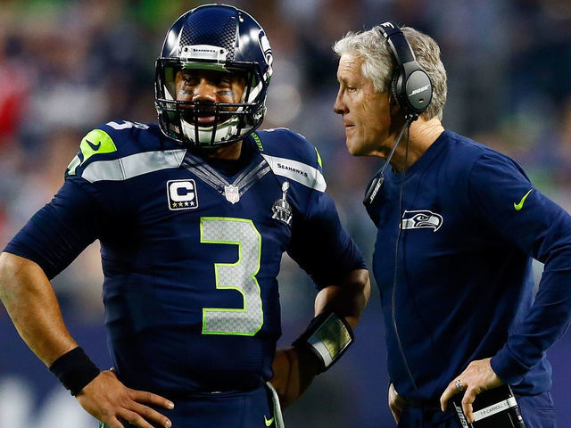 GLENDALE, AZ - FEBRUARY 01: Head coach Pete Carroll of the Seattle Seahawks talks to Russell Wilson #3 of the Seattle Seahawks in the second quarter during Super Bowl XLIX at University of Phoenix Stadium on February 1, 2015 in Glendale, Arizona.