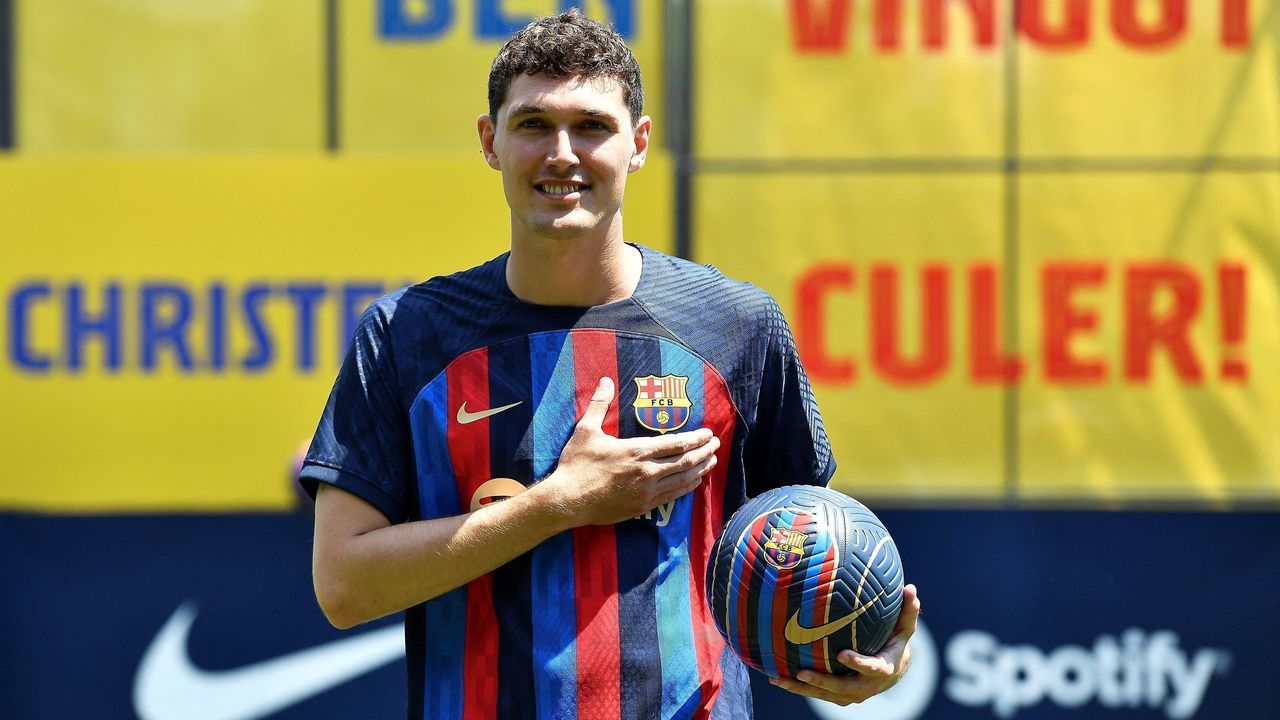 FC Barcelona's new Danish defender Andreas Christensen poses for pictures with his new jersey during his presentation ceremony at the Joan Gamper training ground in Sant Joan Despi, near Barcelona on July 7, 2022.