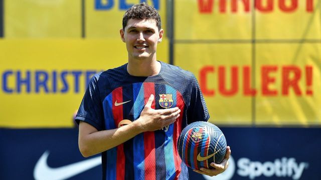 FC Barcelona's new Danish defender Andreas Christensen poses for pictures with his new jersey during his presentation ceremony at the Joan Gamper training ground in Sant Joan Despi, near Barcelona on July 7, 2022.