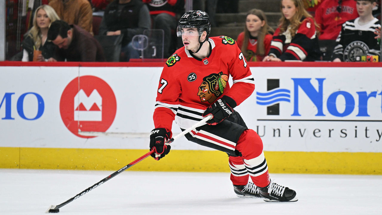 CHICAGO, ILLINOIS - MARCH 20: Kirby Dach #77 of the Chicago Blackhawks skates against the Winnipeg Jets on March 20, 2022 at the United Center in Chicago, Illinois.
