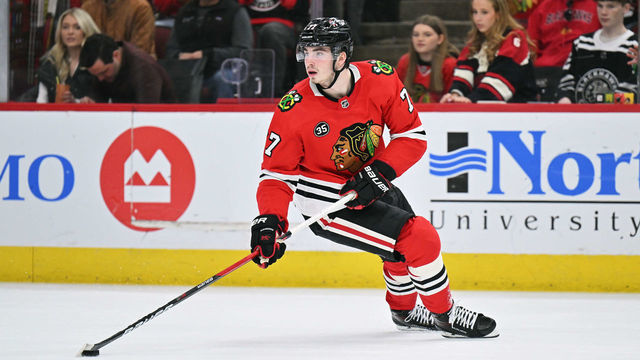 CHICAGO, ILLINOIS - MARCH 20: Kirby Dach #77 of the Chicago Blackhawks skates against the Winnipeg Jets on March 20, 2022 at the United Center in Chicago, Illinois.
