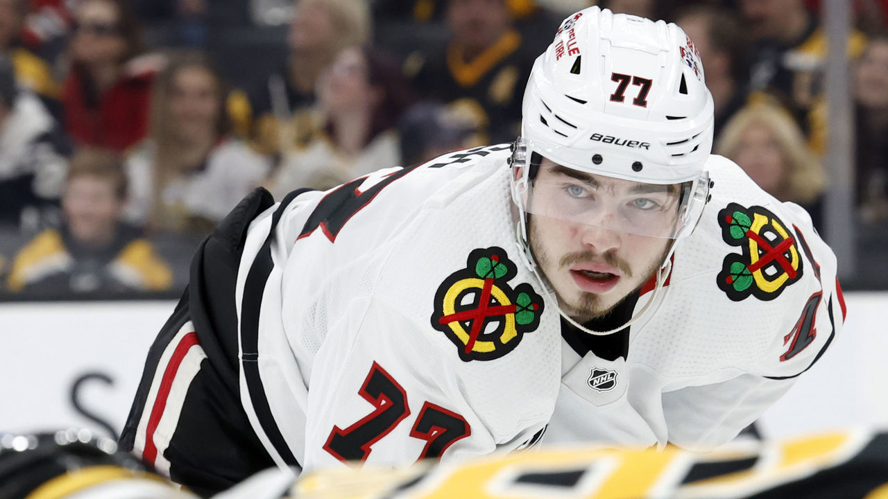 BOSTON, MA - MARCH 10: Chicago Blackhawks right wing Kirby Dach (77) watches a face off during a game between the Boston Bruins and the Chicago Blackhawks on March 10, 2022, at TD Garden in Boston, Massachusetts.
