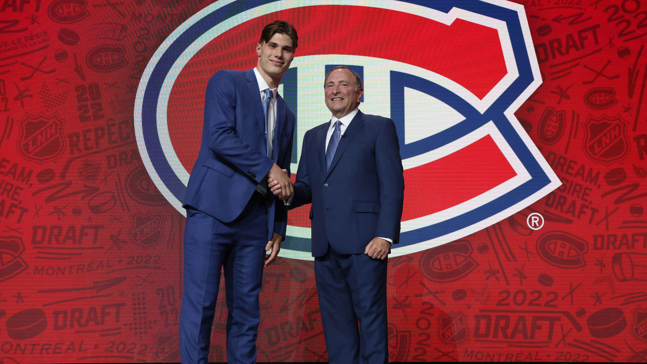 MONTREAL, QUEBEC - JULY 07: Juraj Slafkovsky of the Montreal Canadiens, first overall pick of the 2022 Upper Deck NHL Draft, stands onstage with NHL Commissioner Gary Bettman at Bell Centre on July 07, 2022 in Montreal, Quebec.