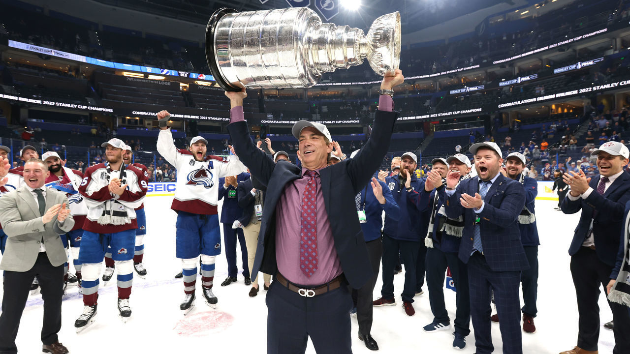 TAMPA, FLORIDA - JUNE 26: General Manager Joe Sakic of the Colorado Avalanche hoists the Stanley Cup after Game Six of the 2022 Stanley Cup Final at Amalie Arena on June 26, 2022 in Tampa, Florida. The Colorado Avalanche defeated the Tampa Bay Lightning 2-1 in Game Six to take the best of seven Stanley Cup Final series 4 games to 2.
