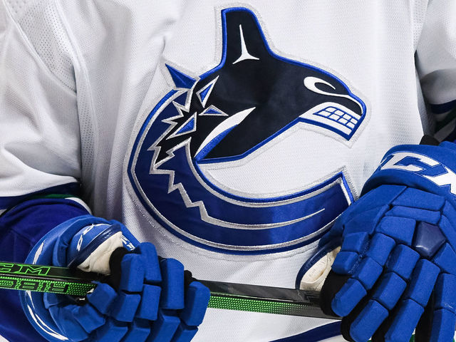 MONTREAL, QC - NOVEMBER 29: View of a Vancouver Canucks logo on a jersey during the Vancouver Canucks versus the Montreal Canadiens game on November 29, 2021, at Bell Centre in Montreal, QC