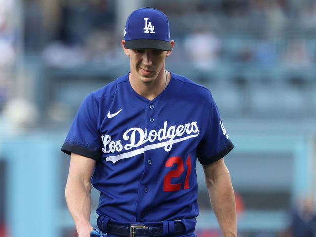 LOS ANGELES, CALIFORNIA - JUNE 04: Walker Buehler #21 of the Los Angeles Dodgers looks on during the first inning against the New York Mets at Dodger Stadium on June 04, 2022 in Los Angeles, California. The New York Mets won 9-4.