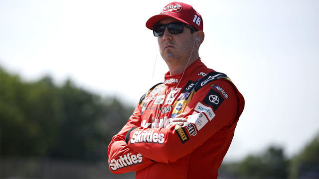 ELKHART LAKE, WISCONSIN - JULY 02: Kyle Busch, driver of the #18 Skittles America Mix Toyota, looks on during practice for the NASCAR Cup Series Kwik Trip 250 at Road America on July 02, 2022 in Elkhart Lake, Wisconsin.