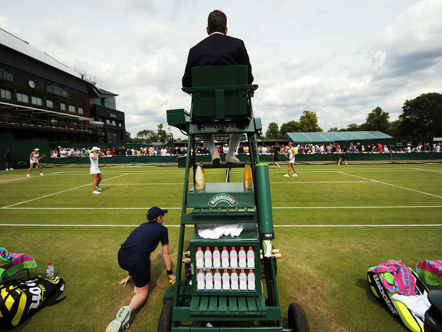 A view of an umpire during a doubles match during day five of the 2011 Wimbledon Championships at the All England Lawn Tennis and Croquet Club, Wimbledon.