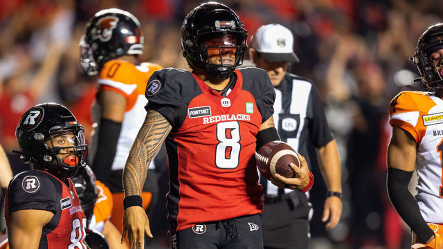 OTTAWA, ON - JUNE 30: Ottawa Redblacks quarterback Jeremiah Masoli (8) with the ball after a touchdown during Canadian Football League action between the BC Lions and Ottawa Redblacks on June 30, 2022, at TD Place at Lansdowne Park in Ottawa, ON, Canada.