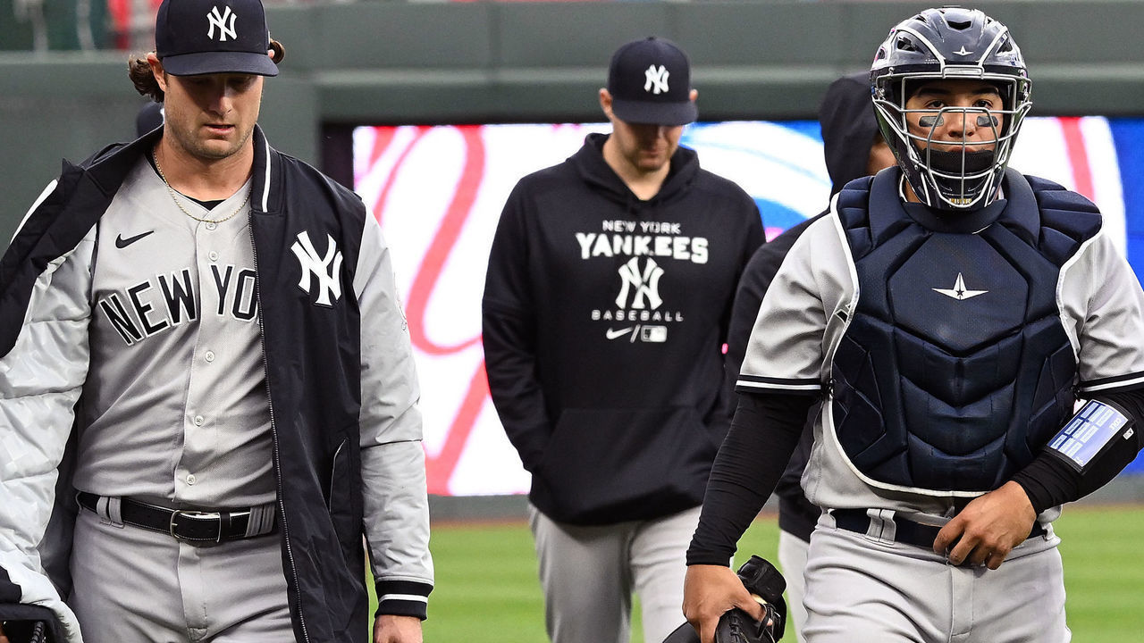 KANSAS CITY, MO - APRIL 30: New York Yankees starting pitcher Gerrit Cole (45) and New York Yankees catcher Jose Trevino (39) following bullpen warmups before a MLB game between the New York Yankees and the Kansas City Royals on April 30, 2022, at Kauffman Stadium, Kansas City, MO. ,