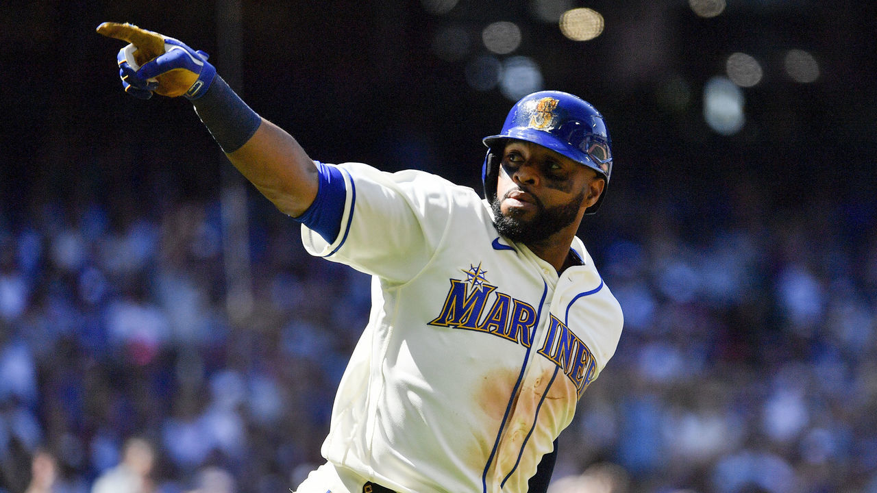 SEATTLE, WASHINGTON - JULY 10: Carlos Santana #41 of the Seattle Mariners gestures after hitting a two run home run during the eighth inning against the Toronto Blue Jays at T-Mobile Park on July 10, 2022 in Seattle, Washington.