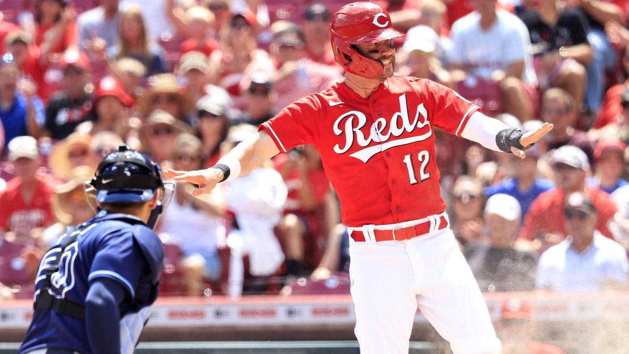 Cincinnati Reds' Tyler Stephenson blows a bubble as he runs the bases  during a baseball game