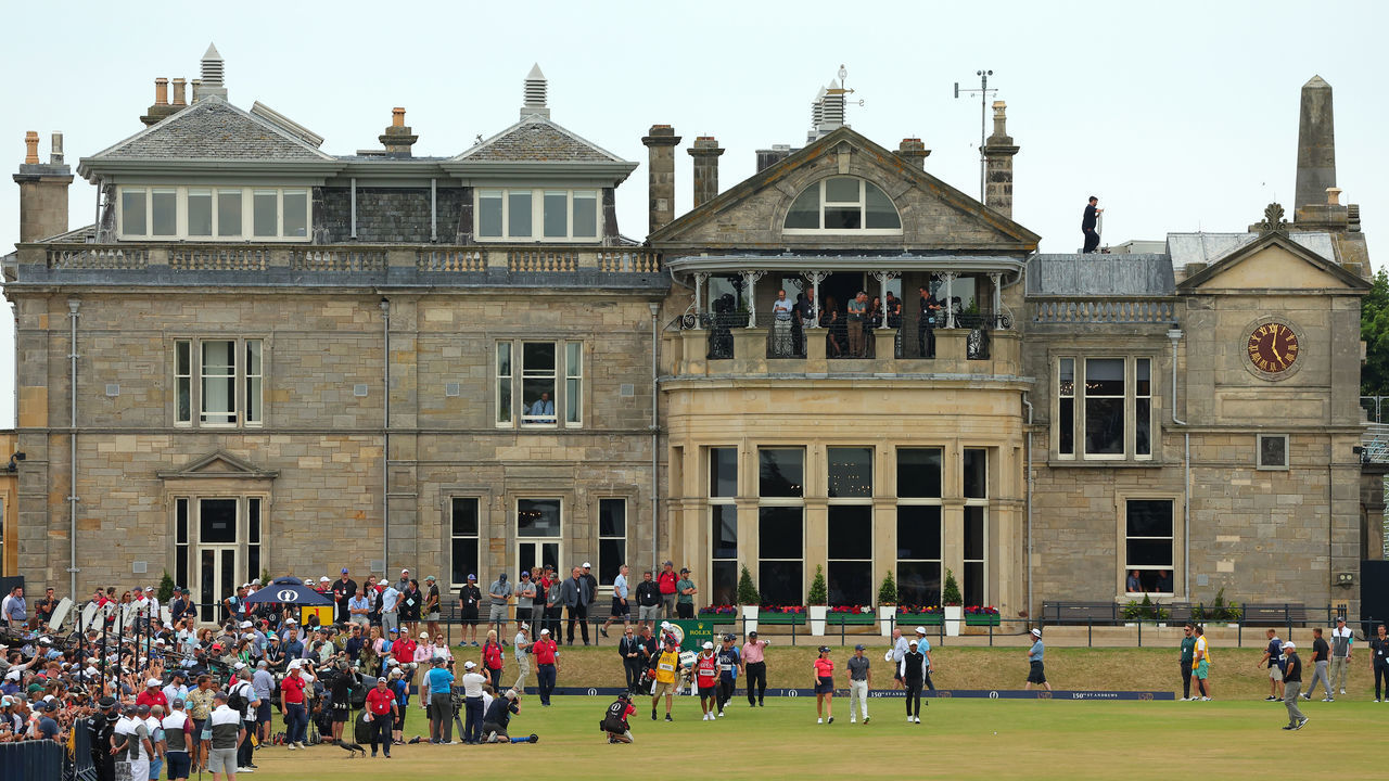 ST ANDREWS, SCOTLAND - JULY 11:Tiger Woods of The United States, Rory McIlroy of Northern Ireland and Georgia Hall of England walk down the 1st during the Celebration of Champions Challenge during a practice round prior to The 150th Open at St Andrews Old Course on July 11, 2022 in St Andrews, Scotland.