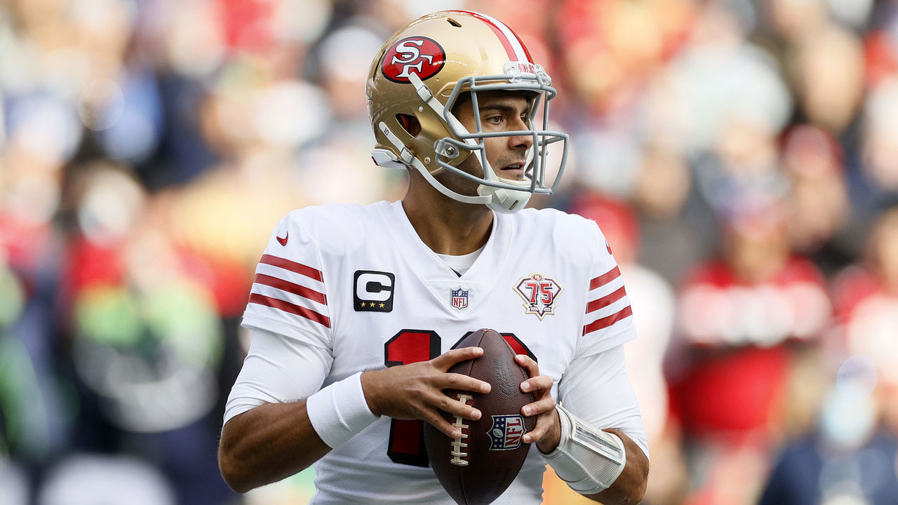 SEATTLE, WASHINGTON - DECEMBER 05: Jimmy Garoppolo #10 of the San Francisco 49ers looks to pass against the Seattle Seahawks during the first quarter at Lumen Field on December 05, 2021 in Seattle, Washington.
