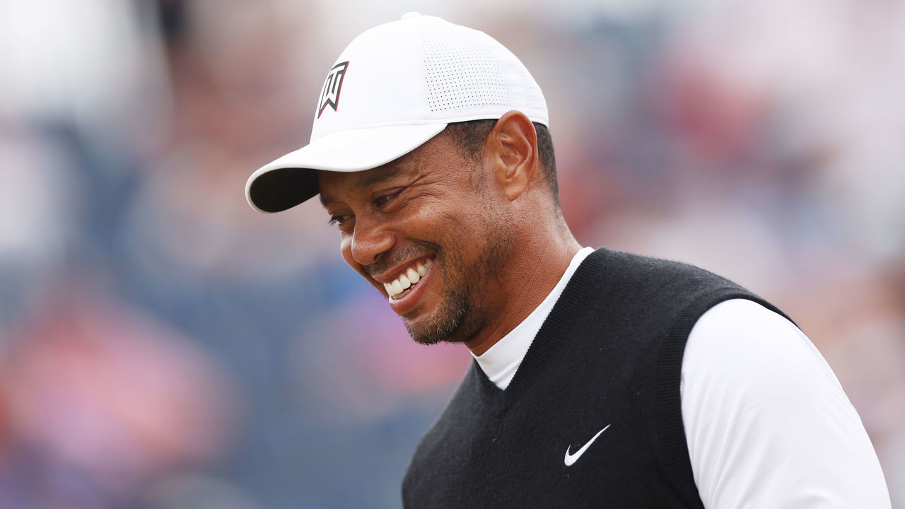 ST ANDREWS, SCOTLAND - JULY 11: Tiger Woods of the United States smiles during the Celebration of Champions prior to The 150th Open at St Andrews Old Course on July 11, 2022 in St Andrews, Scotland.