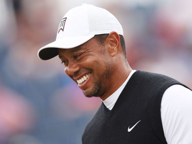 ST ANDREWS, SCOTLAND - JULY 11: Tiger Woods of the United States smiles during the Celebration of Champions prior to The 150th Open at St Andrews Old Course on July 11, 2022 in St Andrews, Scotland.
