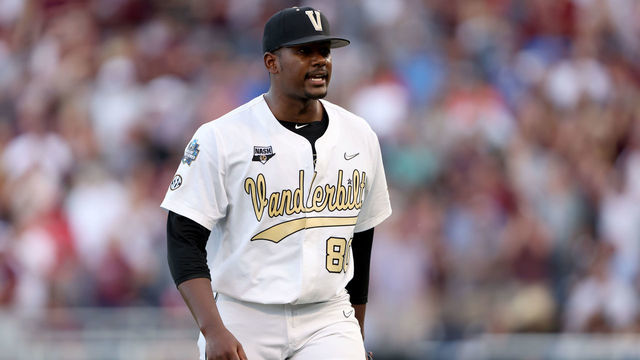 OMAHA, NEBRASKA - JUNE 30: Starting pitcher Kumar Rocker #80 of the Vanderbilt reacts to being pulled from the game against Mississippi St. by Head Coach Tim Corbin of the Vanderbilt in the top of the fifth inning during game three of the College World Series Championship at TD Ameritrade Park Omaha on June 30, 2021 in Omaha, Nebraska.