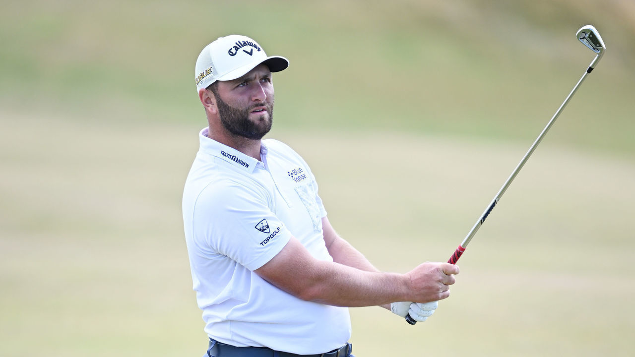 ST ANDREWS, SCOTLAND - JULY 12: Jon Rahm of Spain plays a shot during a practice round prior to The 150th Open at St Andrews Old Course on July 12, 2022 in St Andrews, Scotland.